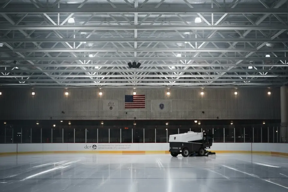 An empty rink and a Zamboni doing its quiet work.